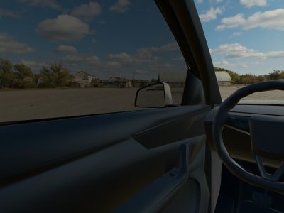 The view from a 3D Tesla Model Y’s driver’s seat in daylight, looking out through 15% film on the side windows
