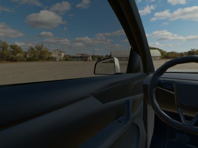 The view from a 3D Tesla Model Y’s driver’s seat in daylight, looking out through 35% film on the side windows